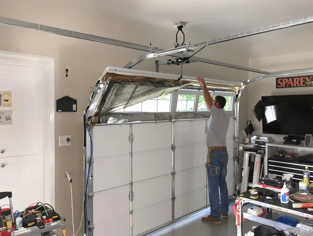 Garage door section replacement by Waterford Garage Door Repair in Waterford